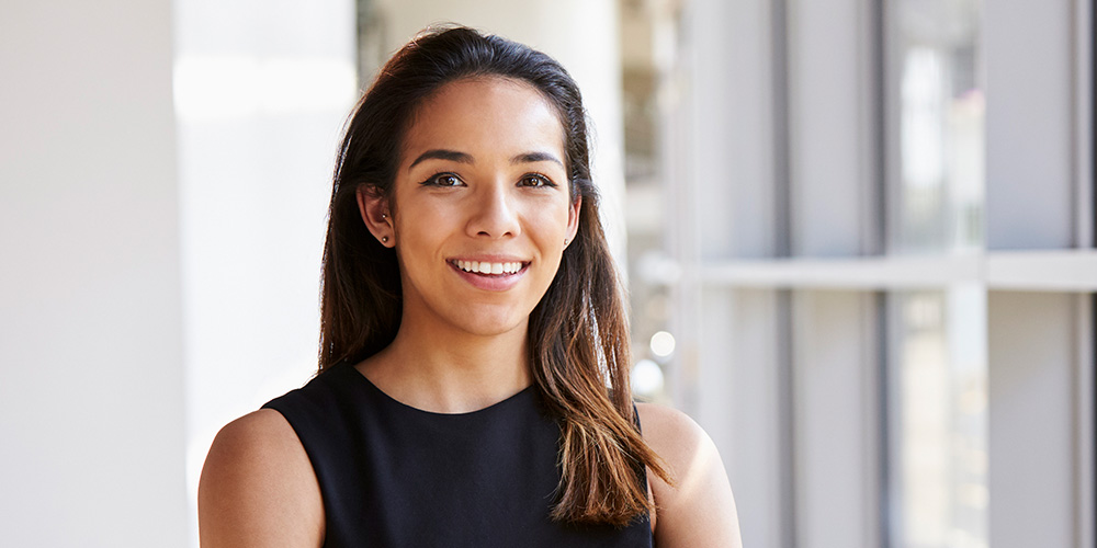 An MPP professional smiling.